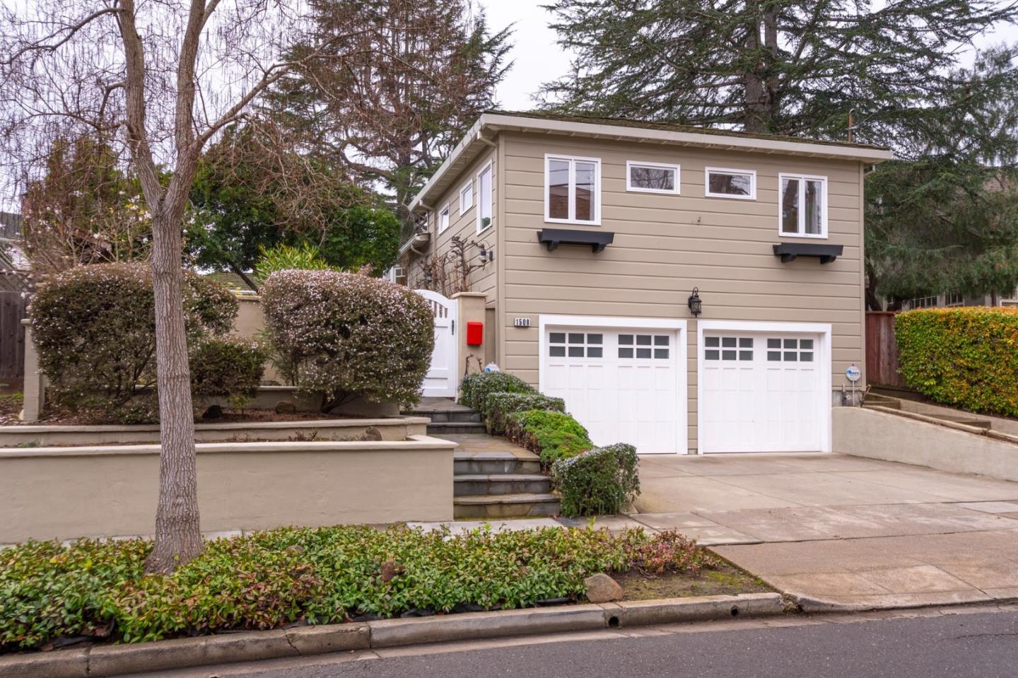 front view of a house with a street