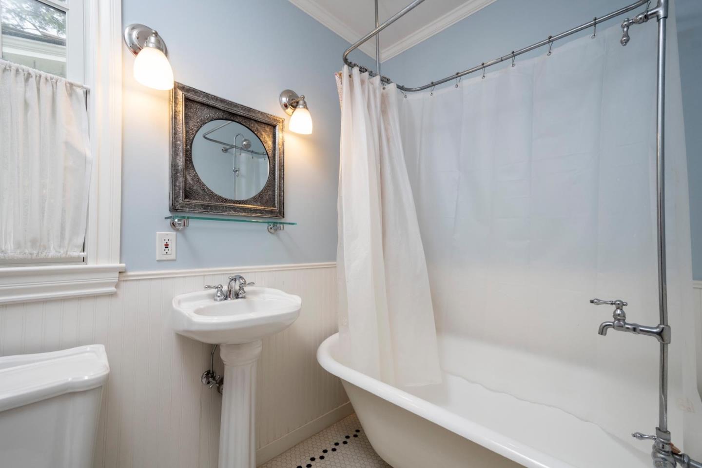 1508 Arc Way Burlingame, CA 94010 - Photo 16 of 18 a bathroom with a sink toilet and shower