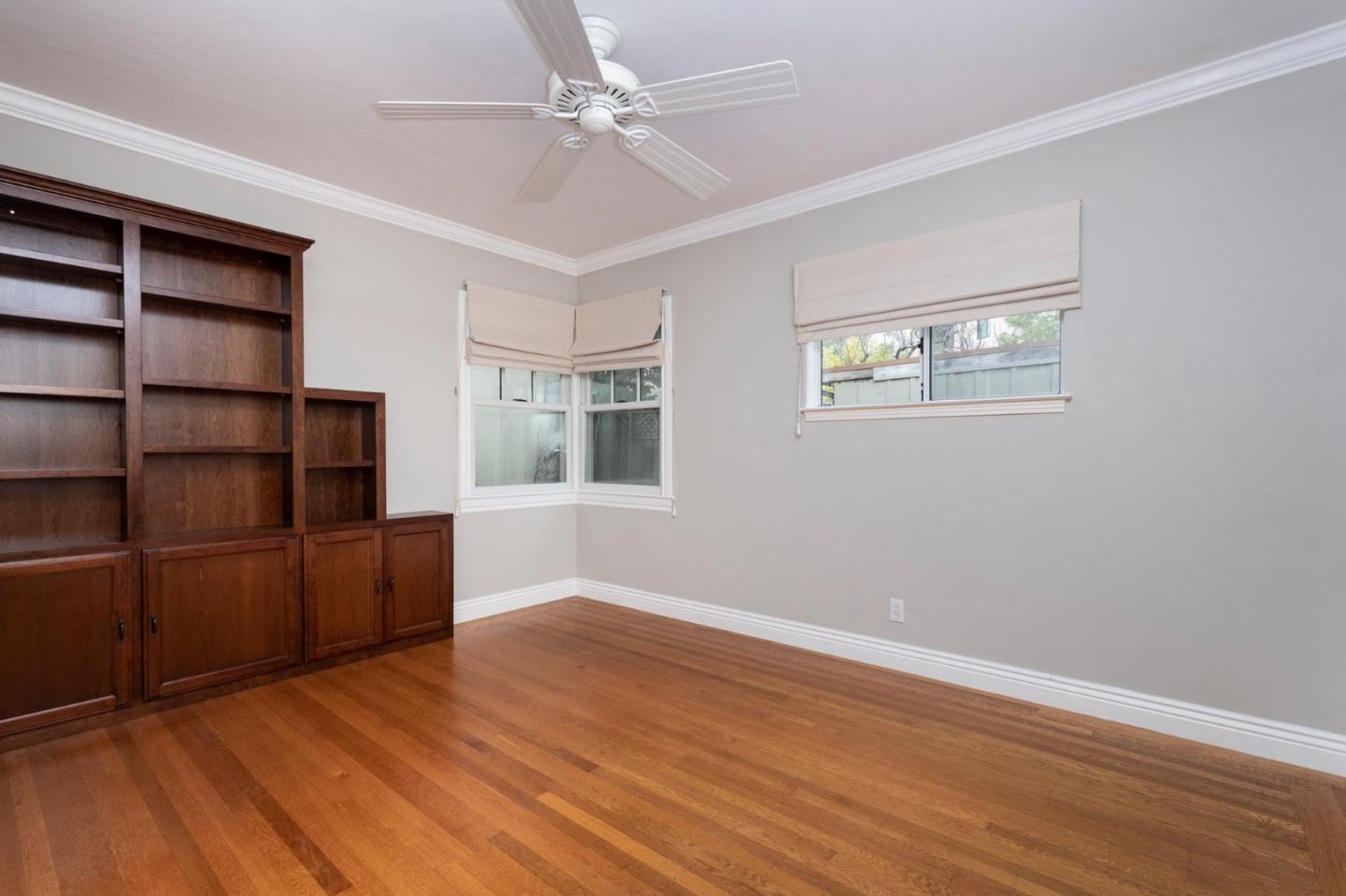 1508 Arc Way Burlingame, CA 94010 - Photo 17 of 18 a view of empty room with wooden floor and fan