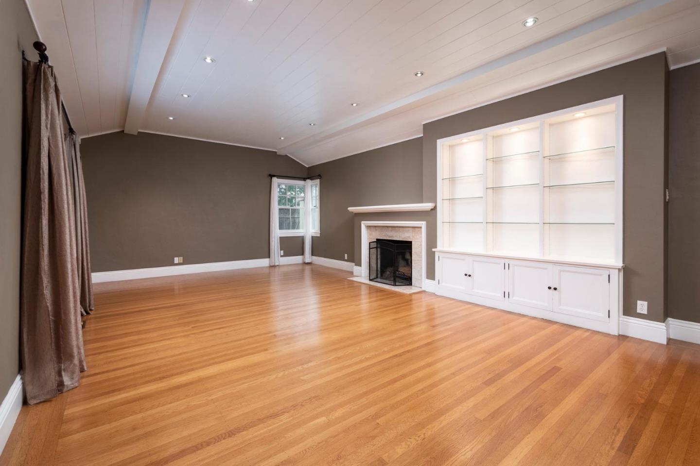 1508 Arc Way Burlingame, CA 94010 - Photo 6 of 18 wooden floor in an empty room with a fireplace