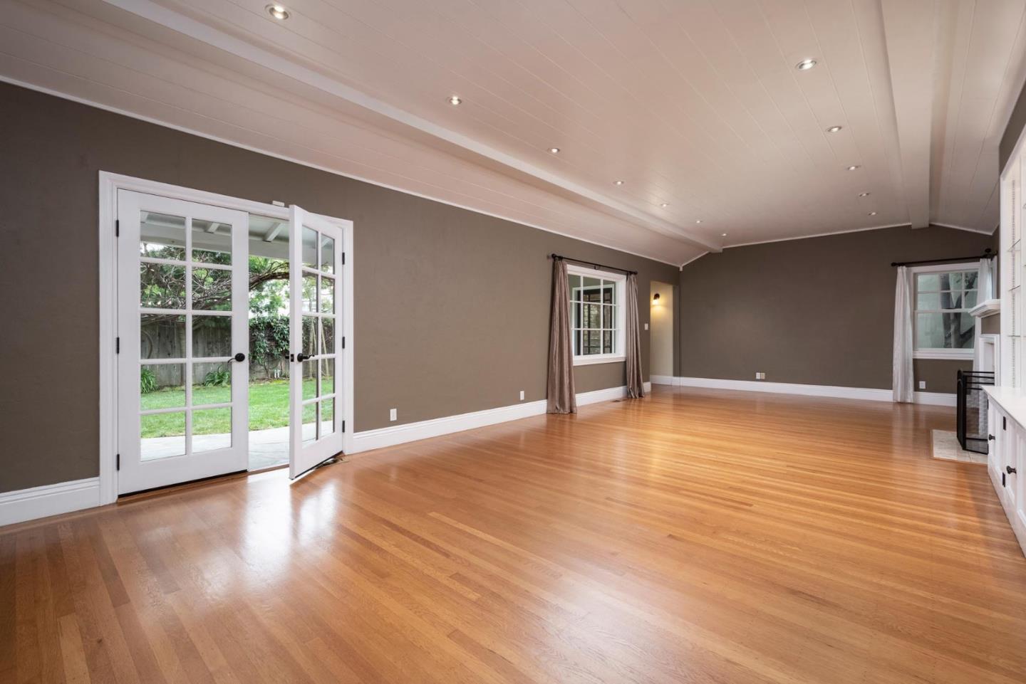 1508 Arc Way Burlingame, CA 94010 - Photo 7 of 18 a view of empty room with wooden floor and floor to ceiling window