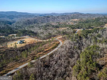 an aerial view of residential house and outdoor space