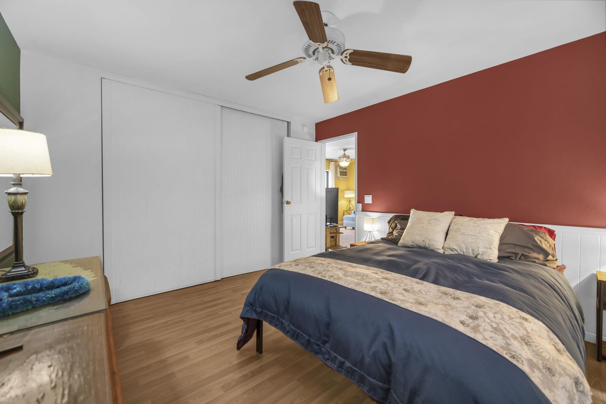 3740 Lower Honoapiilani Road, Unit C205 Lahaina, HI 96761 - Photo 13 of 28 a bedroom with a bed and a table