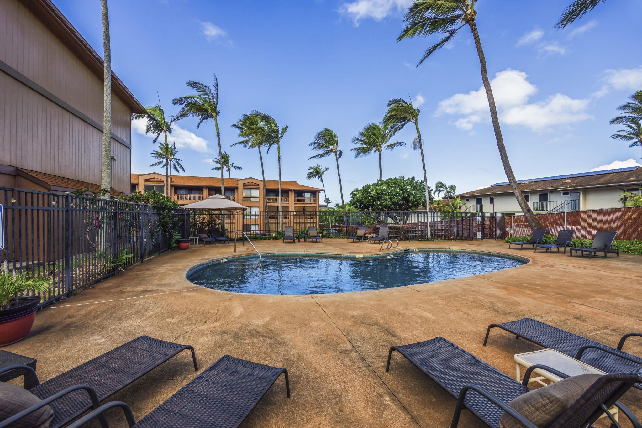3740 Lower Honoapiilani Road, Unit C205 Lahaina, HI 96761 - Photo 26 of 28 a view of a swimming pool with a patio