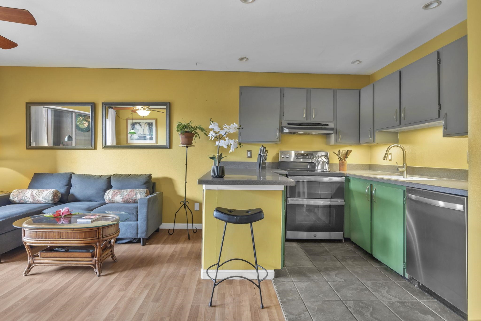 3740 Lower Honoapiilani Road, Unit C205 Lahaina, HI 96761 - Photo 6 of 28 a living room with a sink and furniture