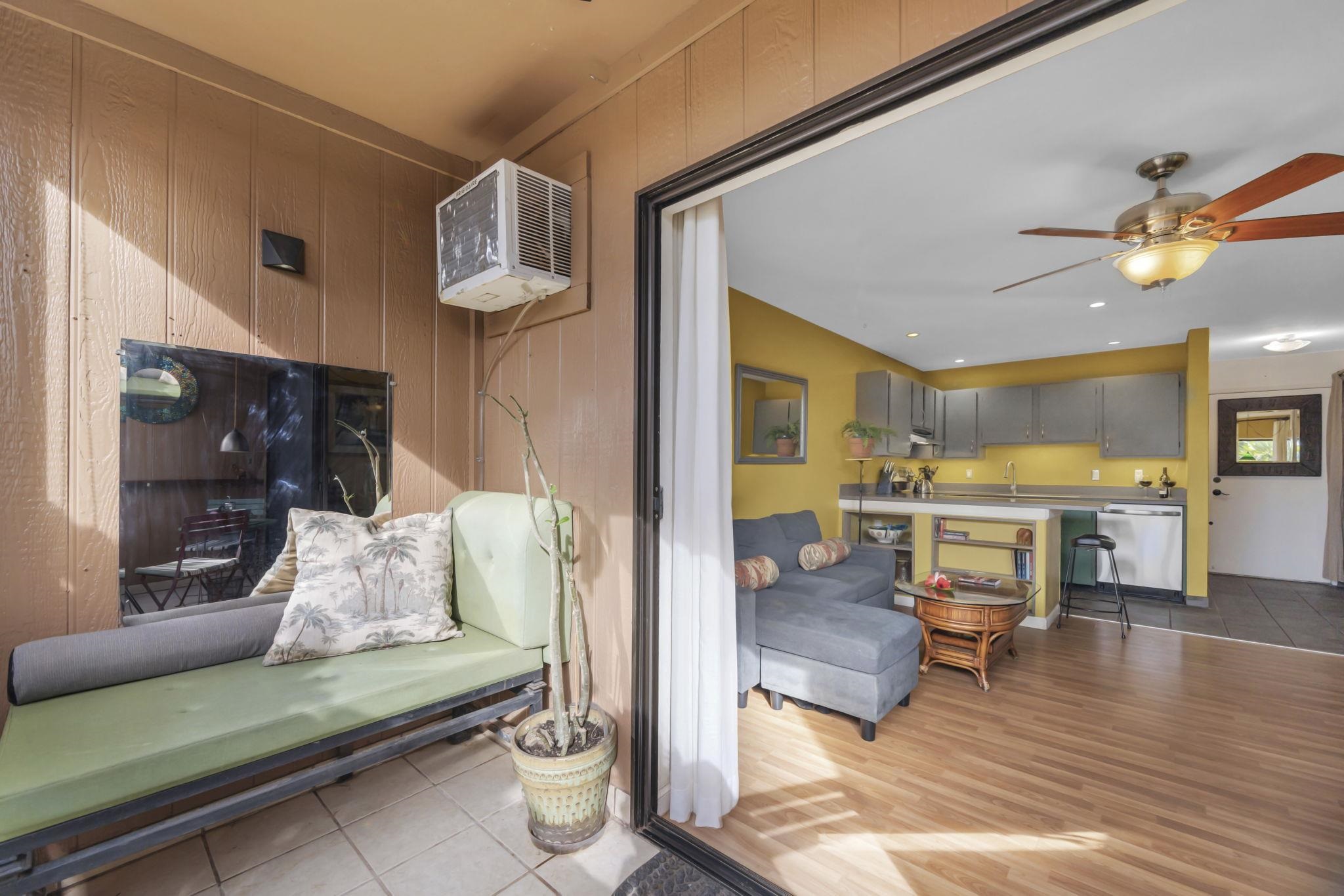 3740 Lower Honoapiilani Road, Unit C205 Lahaina, HI 96761 - Photo 10 of 28 a living room with furniture and a table