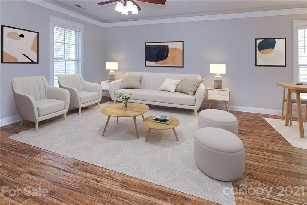 4255 Vance Road North Huntersville, NC 28078 - Photo 3 of 20 a living room with furniture and a wooden floor
