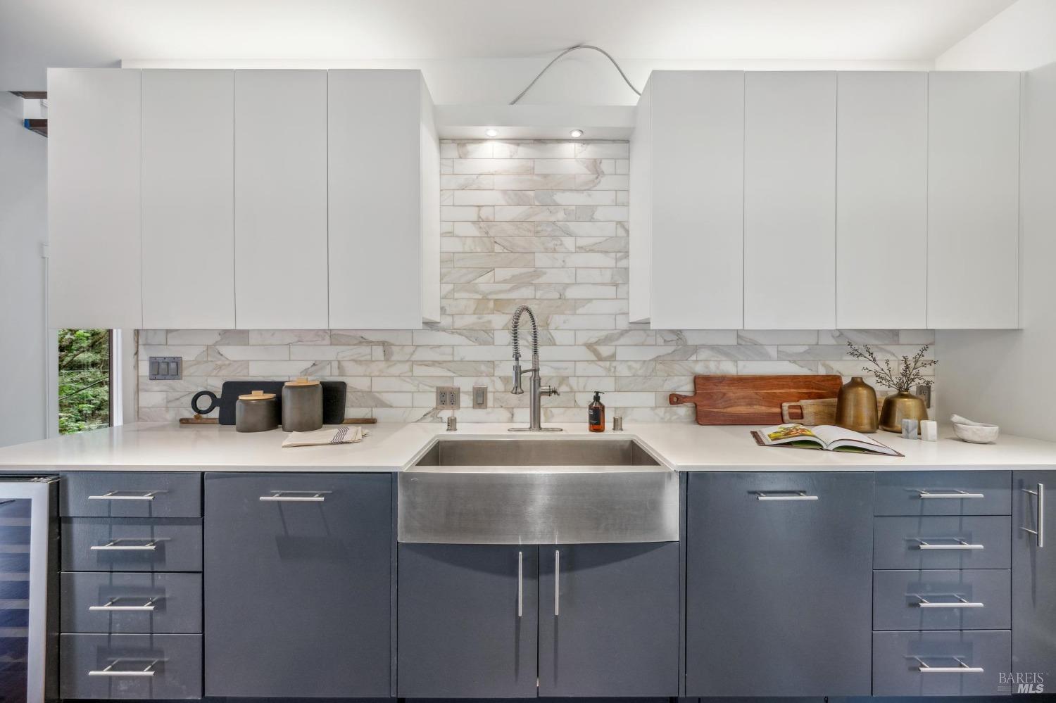 402 Eldridge Avenue Mill Valley, CA 94941 - Photo 17 of 49 a kitchen with a sink a stove a microwave and cabinets