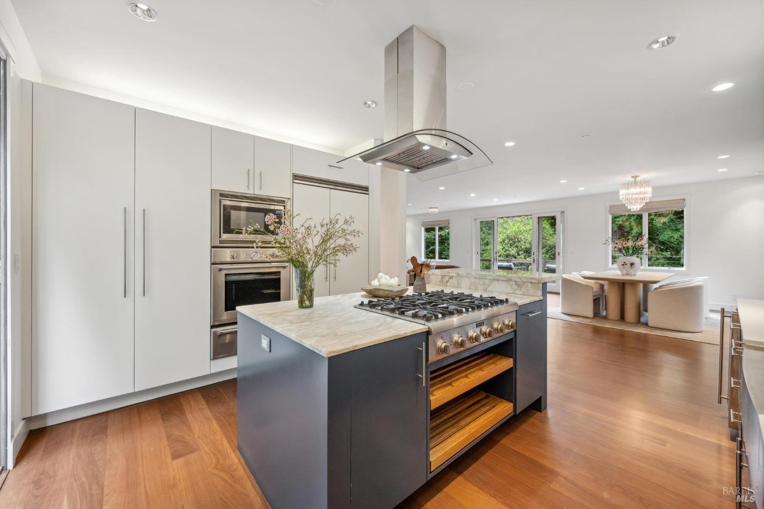 402 Eldridge Avenue Mill Valley, CA 94941 - Photo 19 of 49 a kitchen with kitchen island a stove and a sink