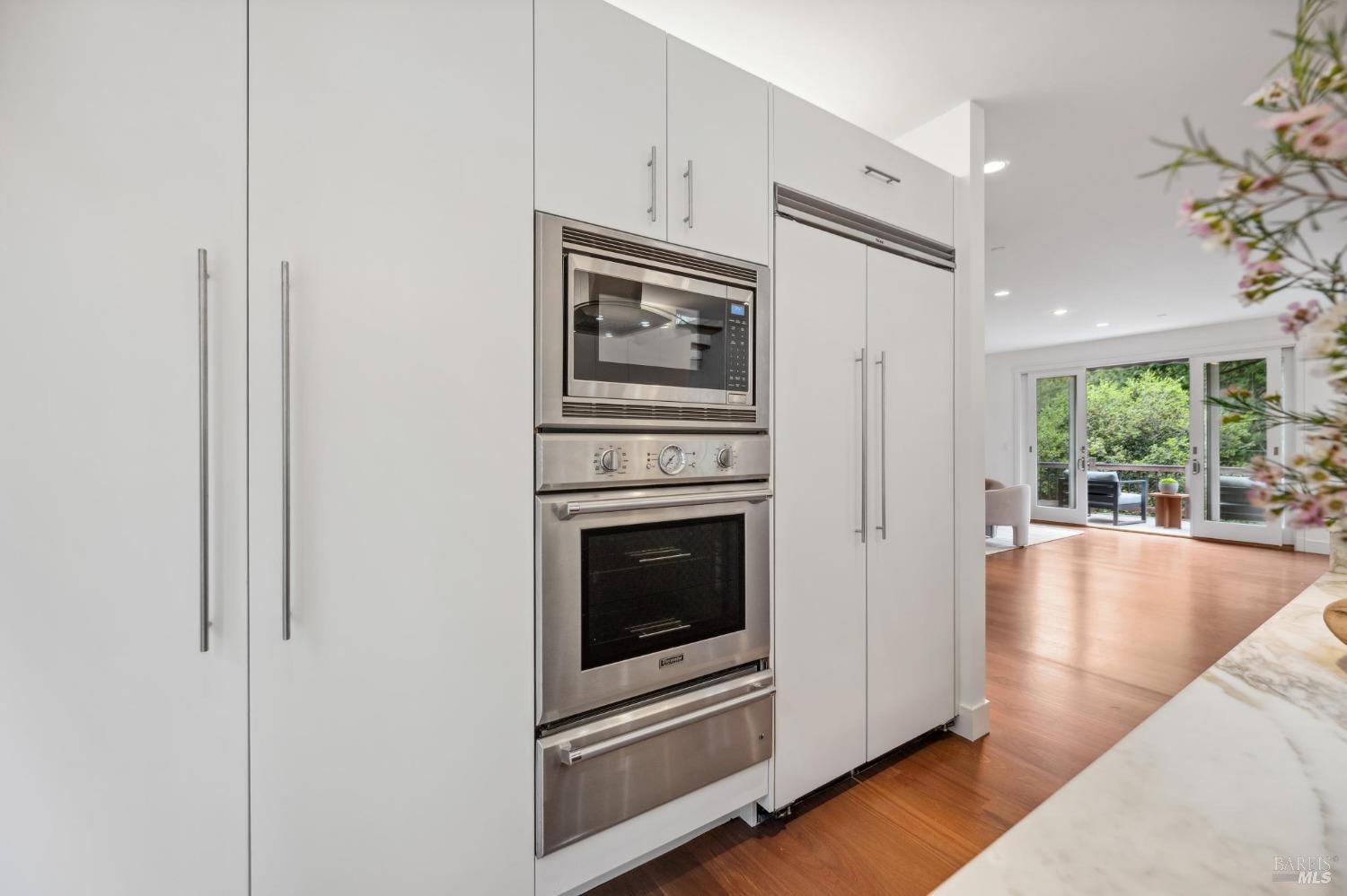 402 Eldridge Avenue Mill Valley, CA 94941 - Photo 21 of 49 a living room with stainless steel appliances furniture and a large window