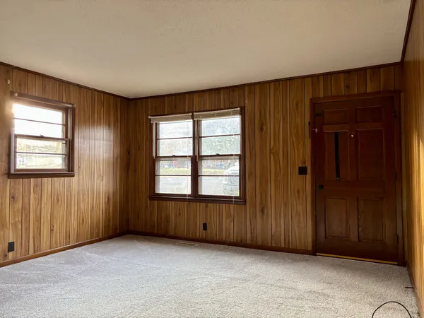 an empty room with windows