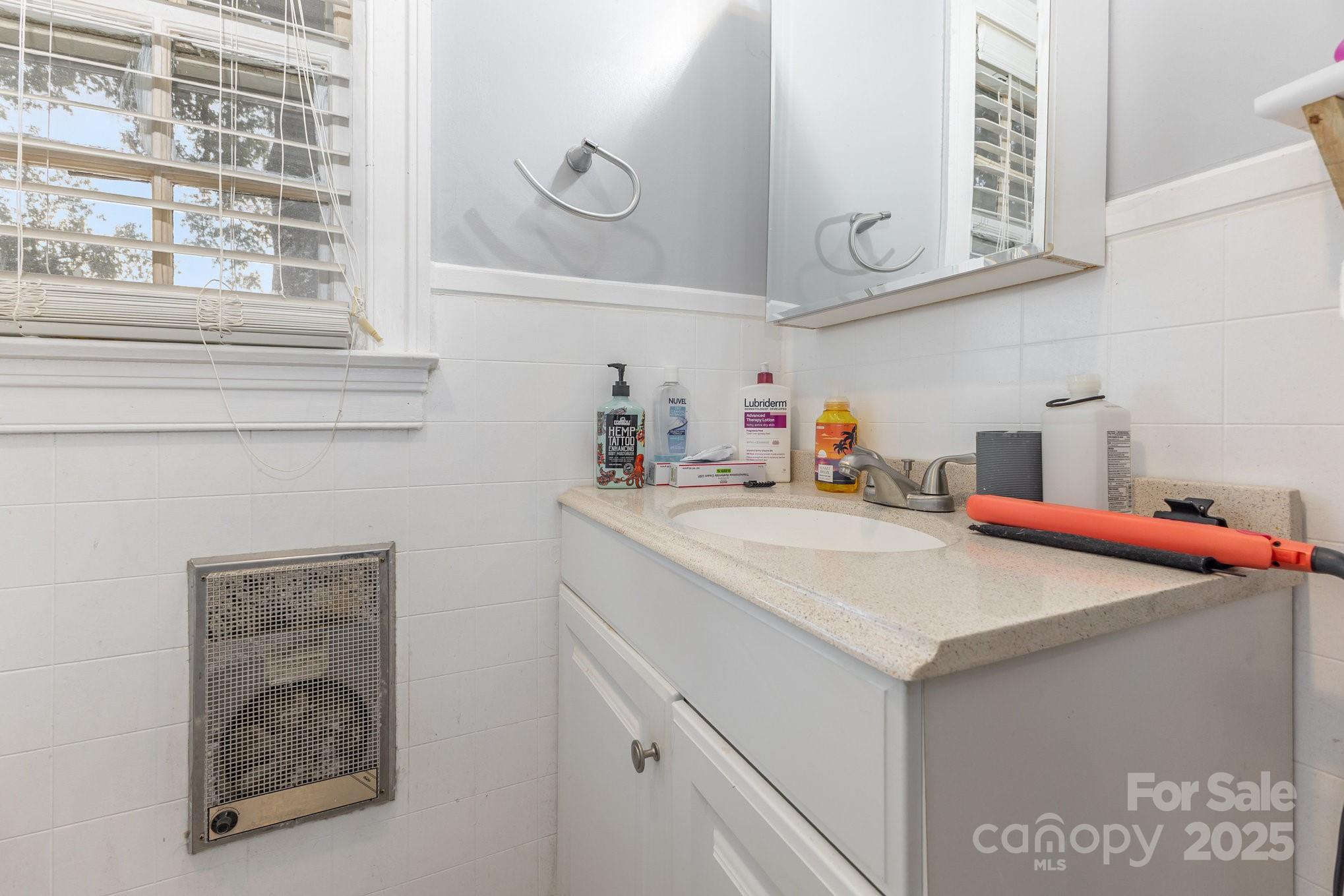 165 Bailey Road Lancaster, SC 29720 - Photo 13 of 33 a kitchen with a sink and a refrigerator