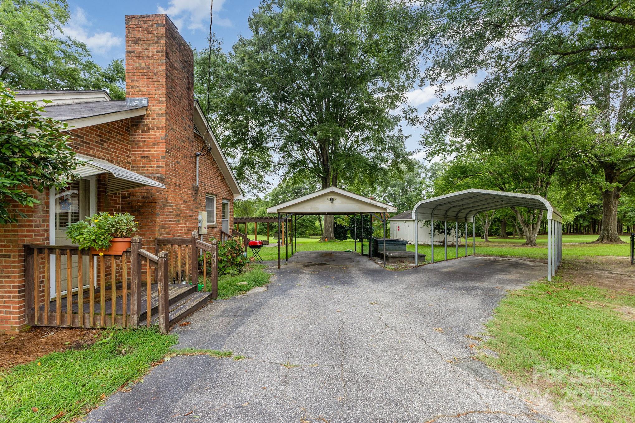 165 Bailey Road Lancaster, SC 29720 - Photo 25 of 33 a house view with a garden space