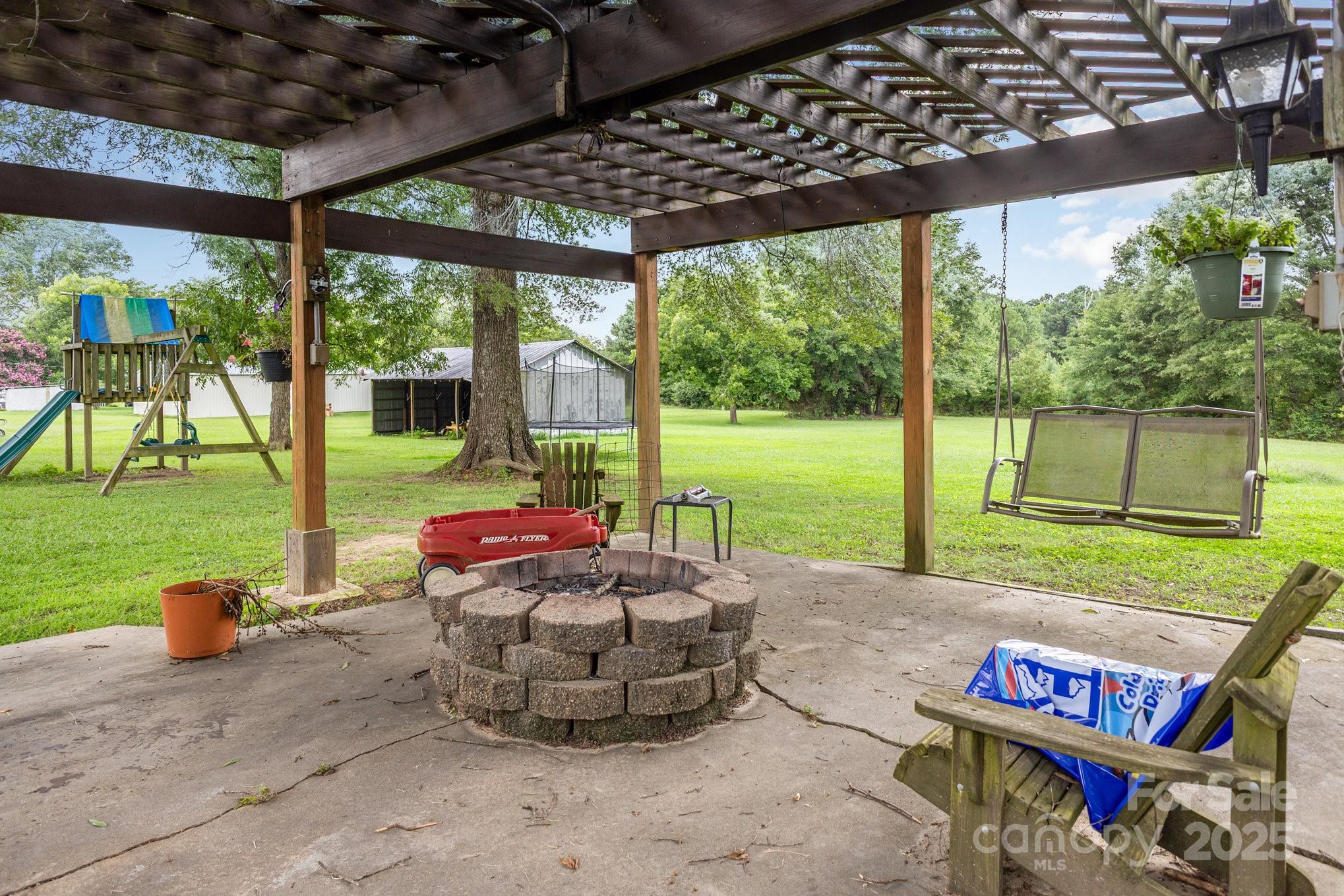 165 Bailey Road Lancaster, SC 29720 - Photo 26 of 33 a view of a porch with furniture and a yard