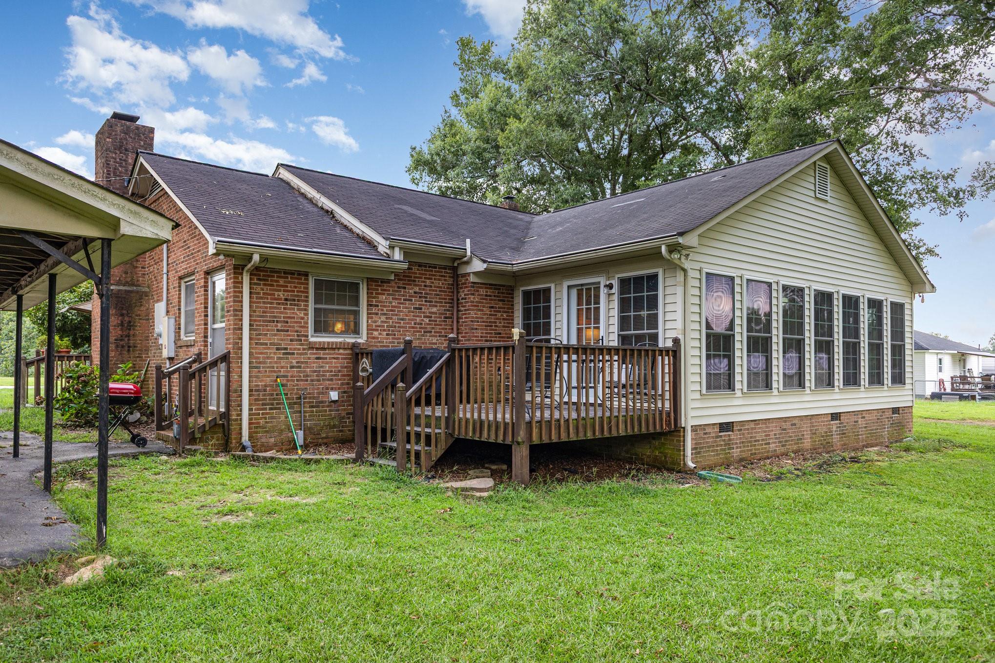 165 Bailey Road Lancaster, SC 29720 - Photo 28 of 33 a view of a house with a backyard and deck