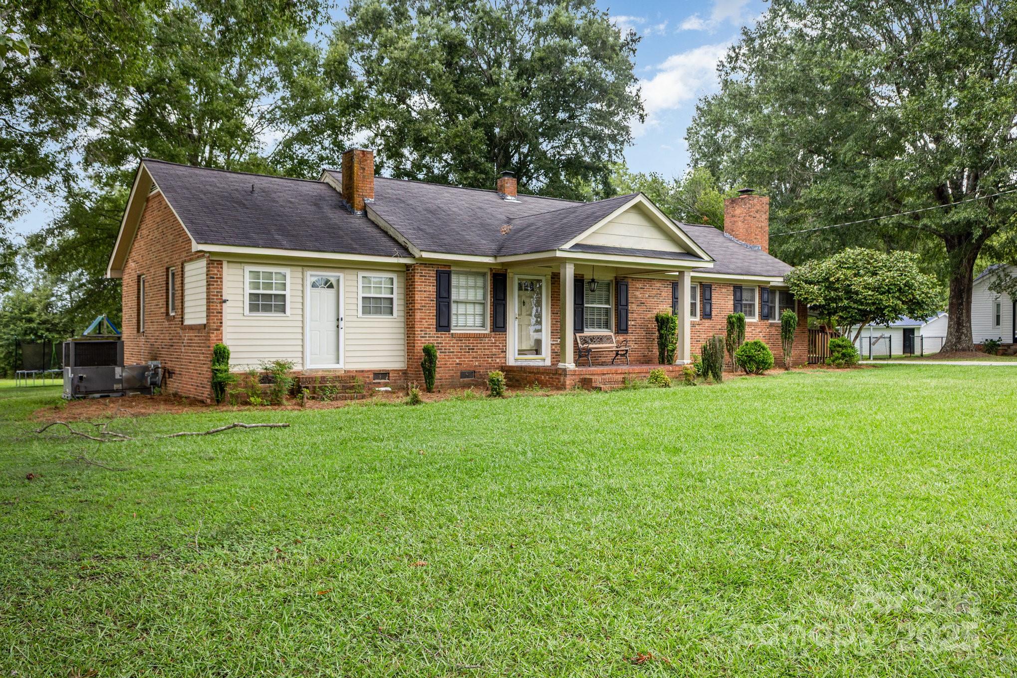 165 Bailey Road Lancaster, SC 29720 - Photo 3 of 33 a front view of a house with a yard and green space