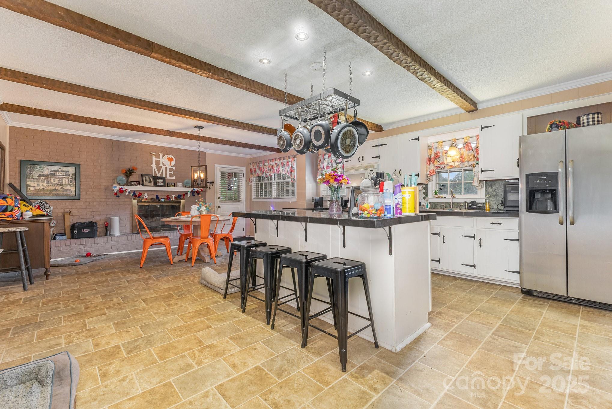 165 Bailey Road Lancaster, SC 29720 - Photo 6 of 33 a living room with stainless steel appliances kitchen island granite countertop furniture and a kitchen view