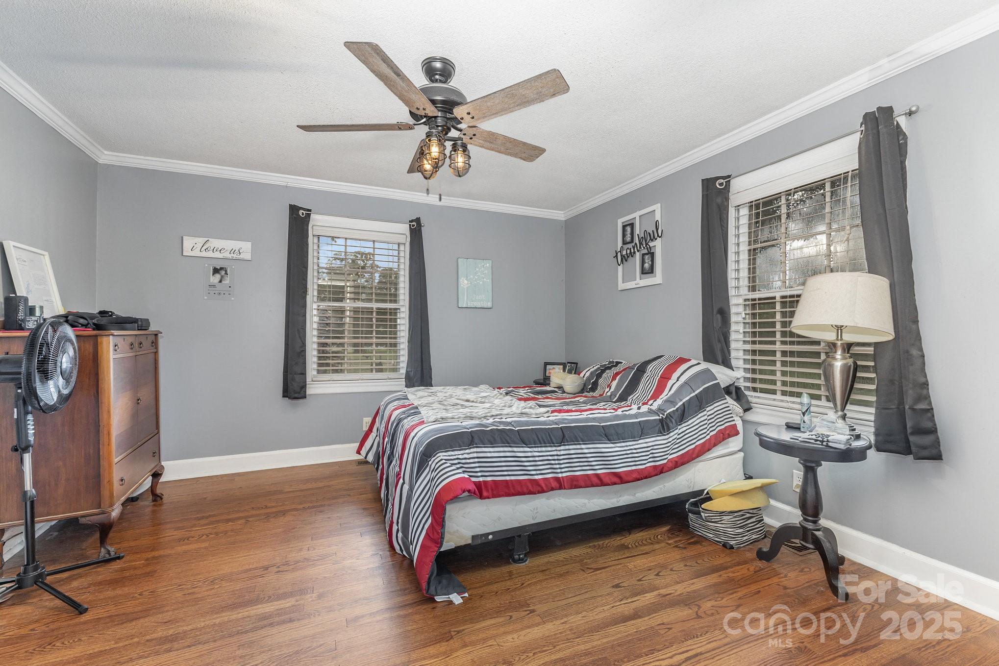 165 Bailey Road Lancaster, SC 29720 - Photo 10 of 33 a bedroom with bed and wooden floor