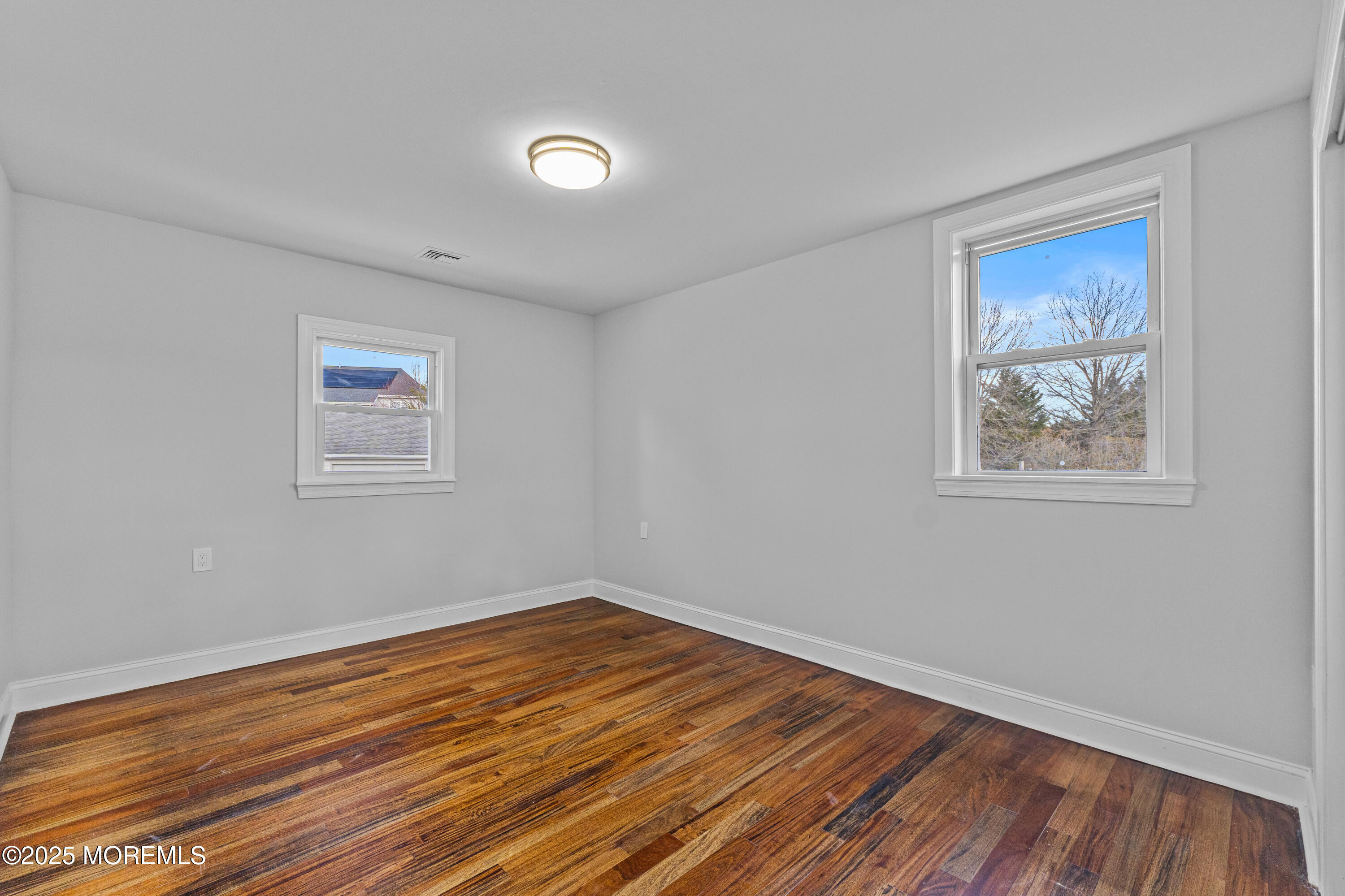 776 Elton Adelphia Road Freehold, NJ 07728 - Photo 16 of 48 a view of empty room with wooden floor