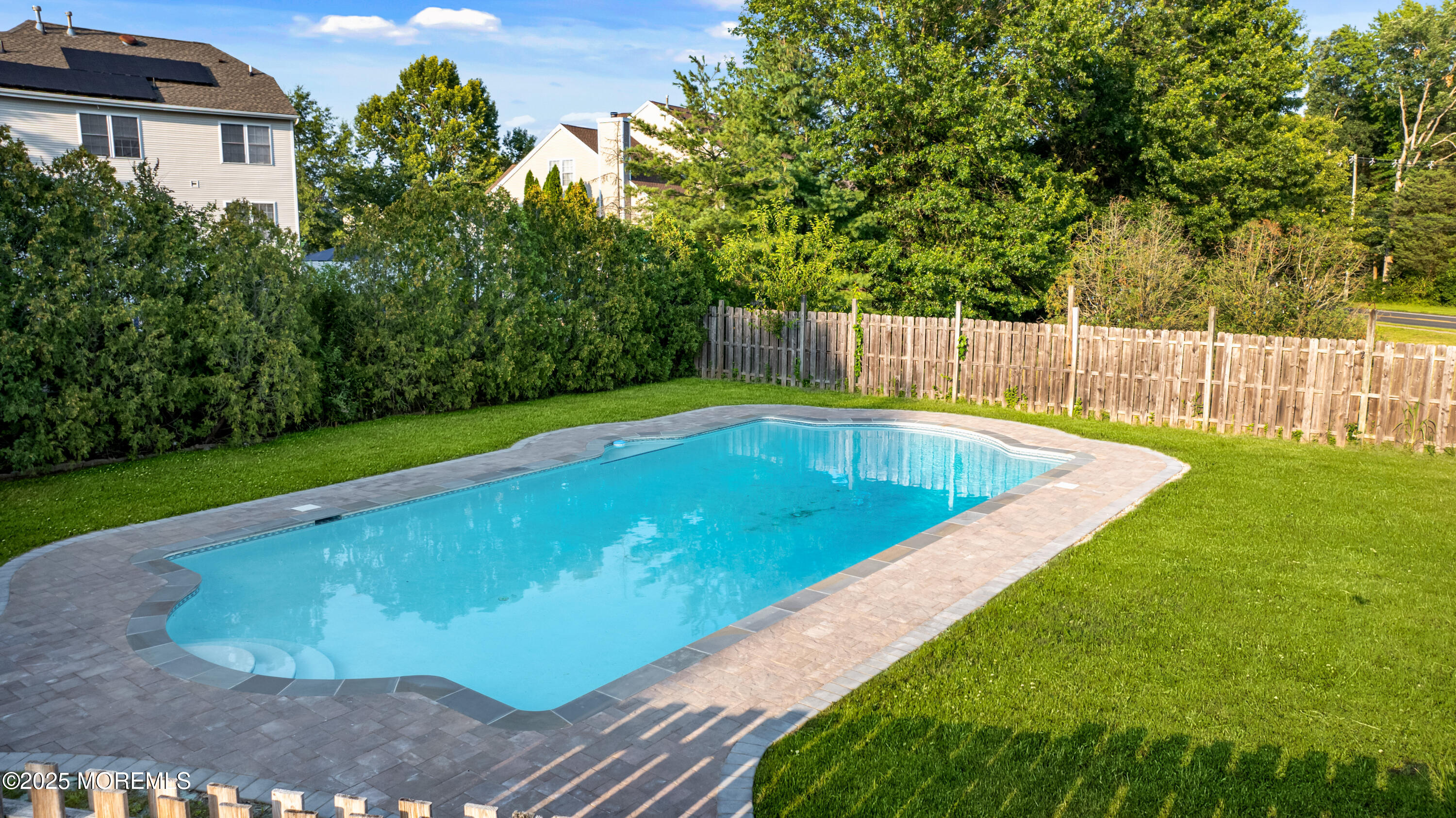 776 Elton Adelphia Road Freehold, NJ 07728 - Photo 36 of 48 a view of a backyard with a small pool