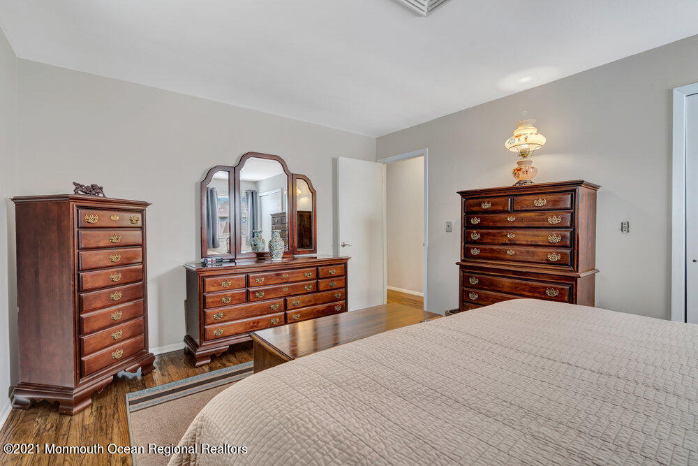 139 Queen Ann Road Brick, NJ 08723 - Photo 21 of 35 a bedroom with a bed and a dresser