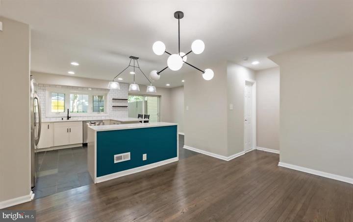 2317 37th Street Northwest Washington, DC 20007 - Photo 12 of 54 Modern kitchen with stylish accents.