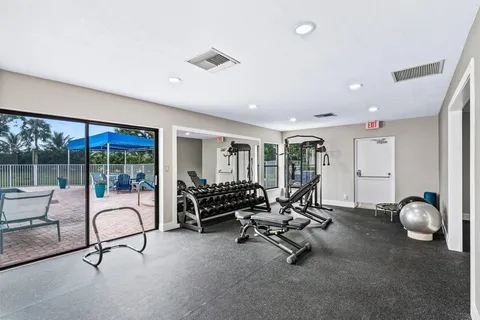 a view of a room with gym equipment
