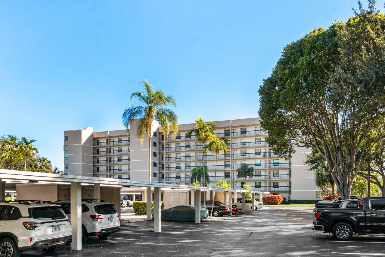 6530 Boca Del Mar Drive, Unit 735 Boca Raton, FL 33433 - Photo 6 of 38 a view of street with parked cars
