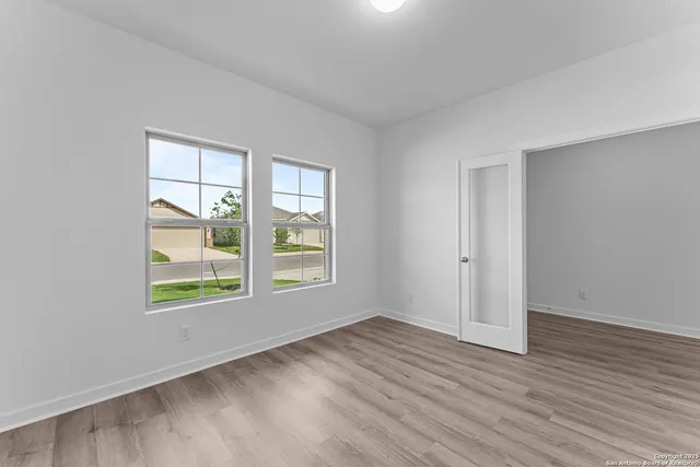 a bathroom with bathtub and shower