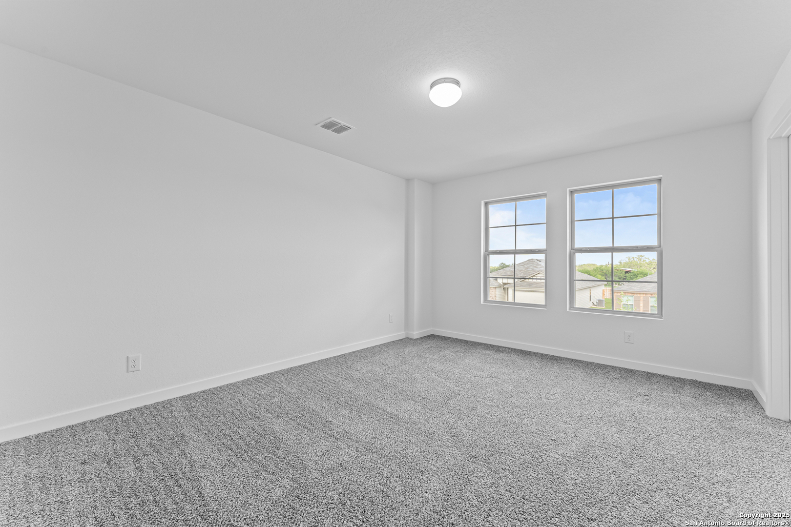 3022 Selhurst Street Converse, TX 78109 - Photo 24 of 32 an empty room with windows