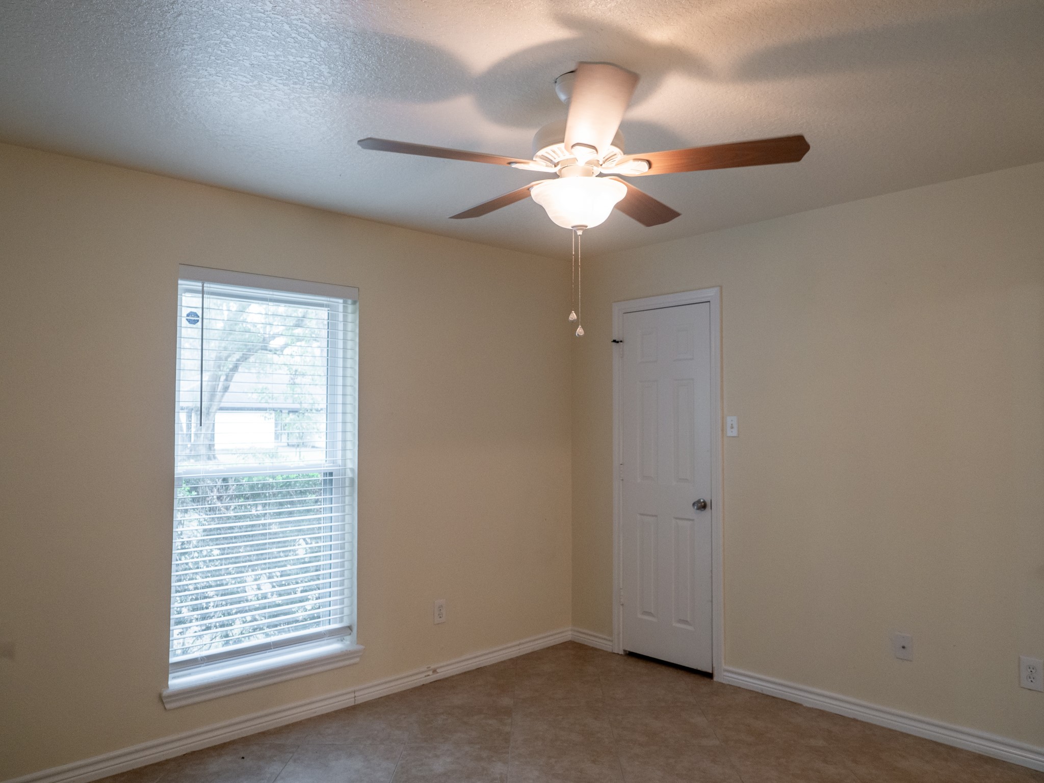 3302 Willie Way Spring, TX 77380 - Photo 15 of 28 an empty room with windows and fan