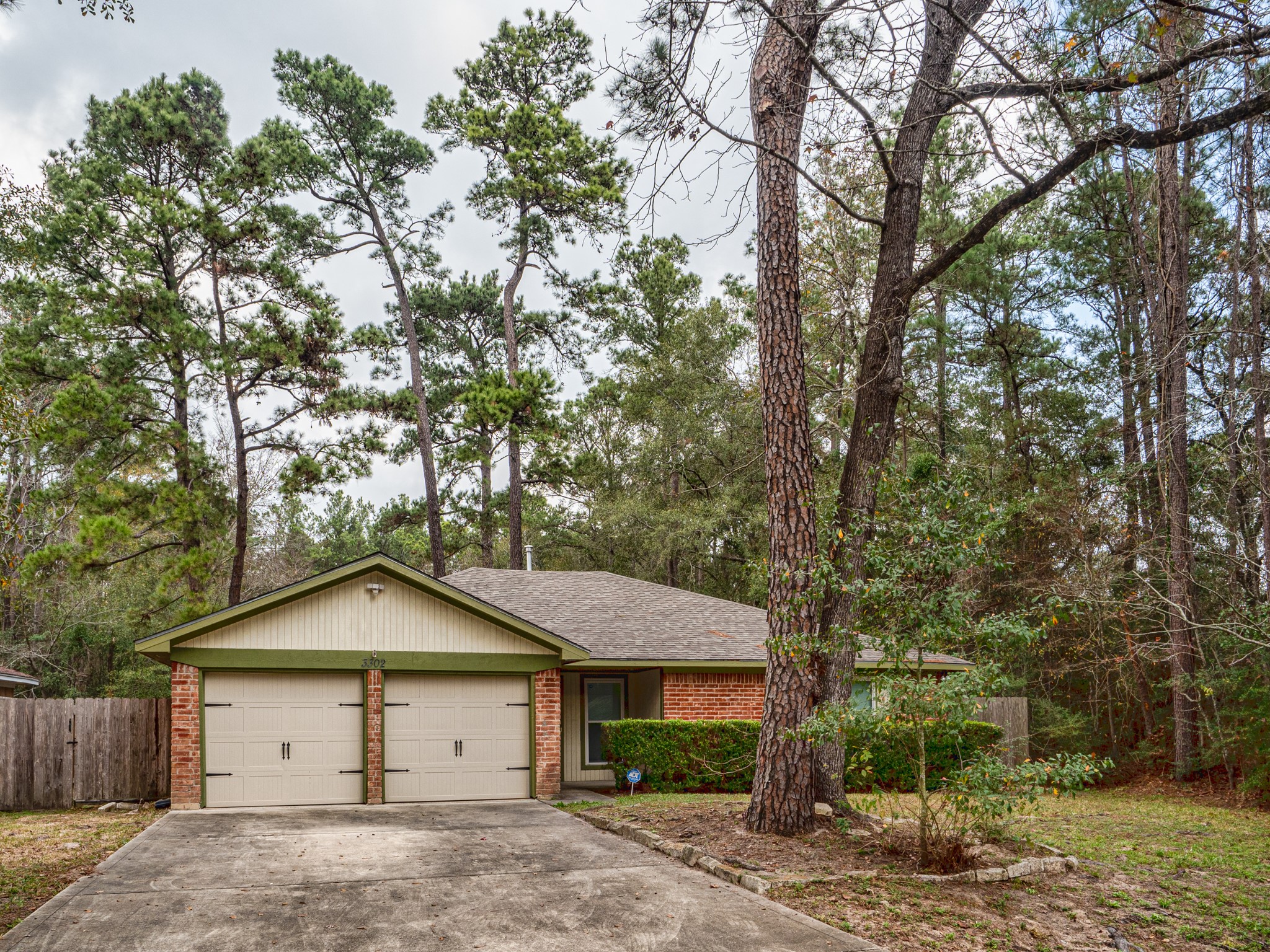 3302 Willie Way Spring, TX 77380 - Photo 2 of 28 a house with trees in the background