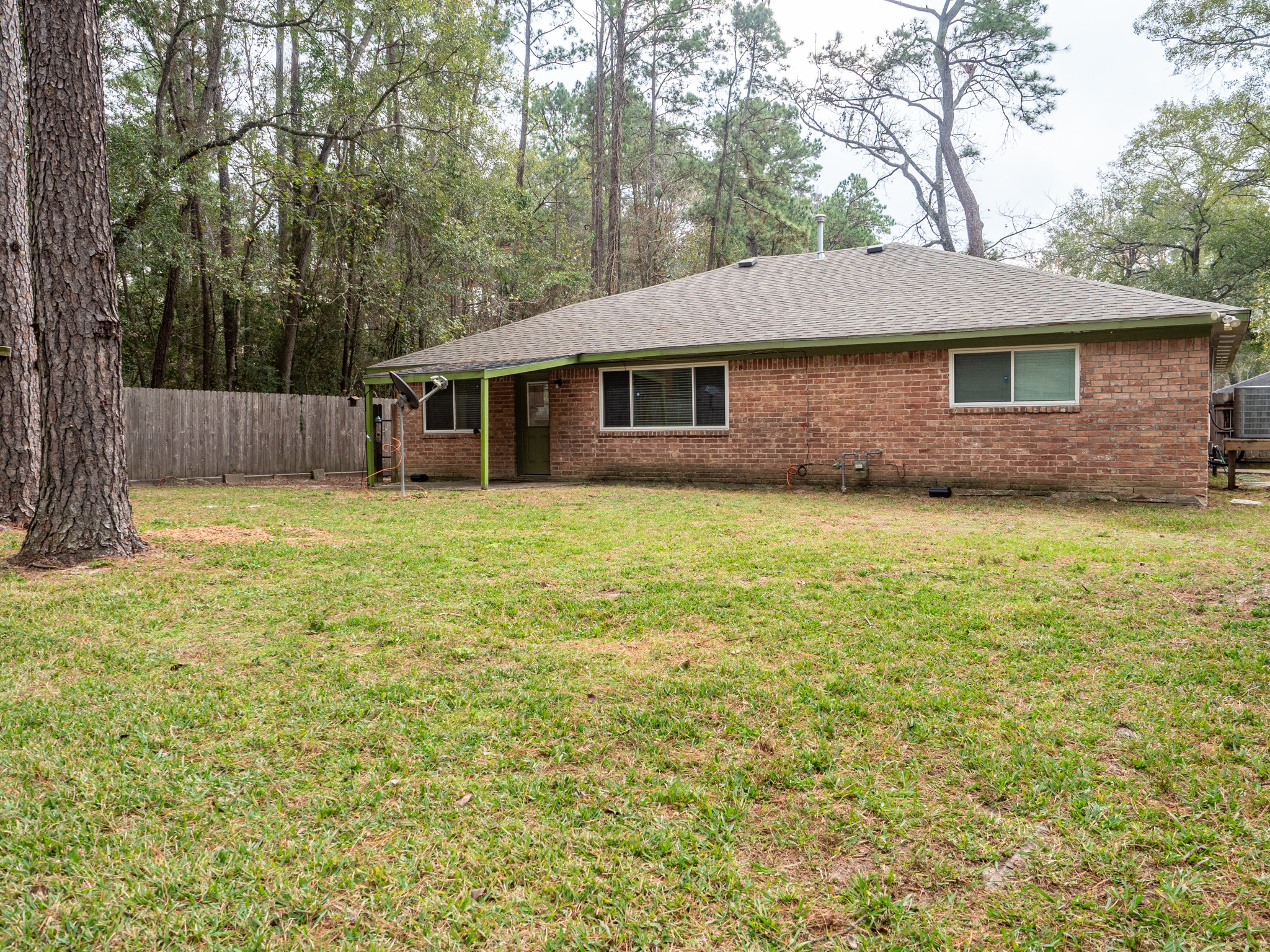 3302 Willie Way Spring, TX 77380 - Photo 26 of 28 a backyard of a house
