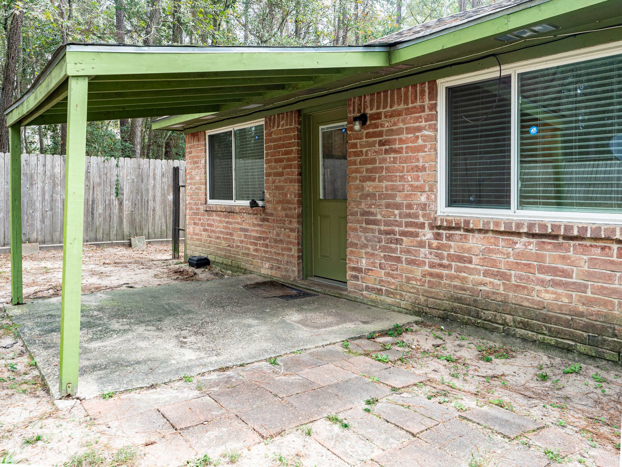 3302 Willie Way Spring, TX 77380 - Photo 27 of 28 a front view of a house with a yard