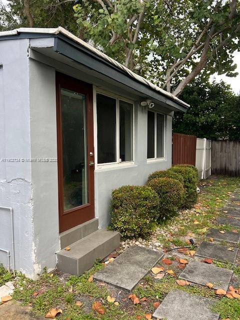 200 Northeast 48th Terrace Miami, FL 33137 - Photo 17 of 20 a view of a house with a yard