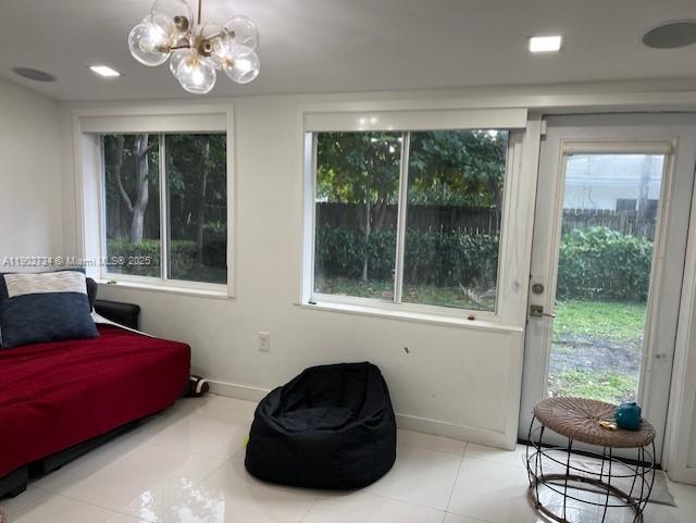 200 Northeast 48th Terrace Miami, FL 33137 - Photo 19 of 20 a living room with furniture and a large window