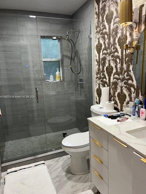 200 Northeast 48th Terrace Miami, FL 33137 - Photo 10 of 20 a bathroom with a sink toilet and shower