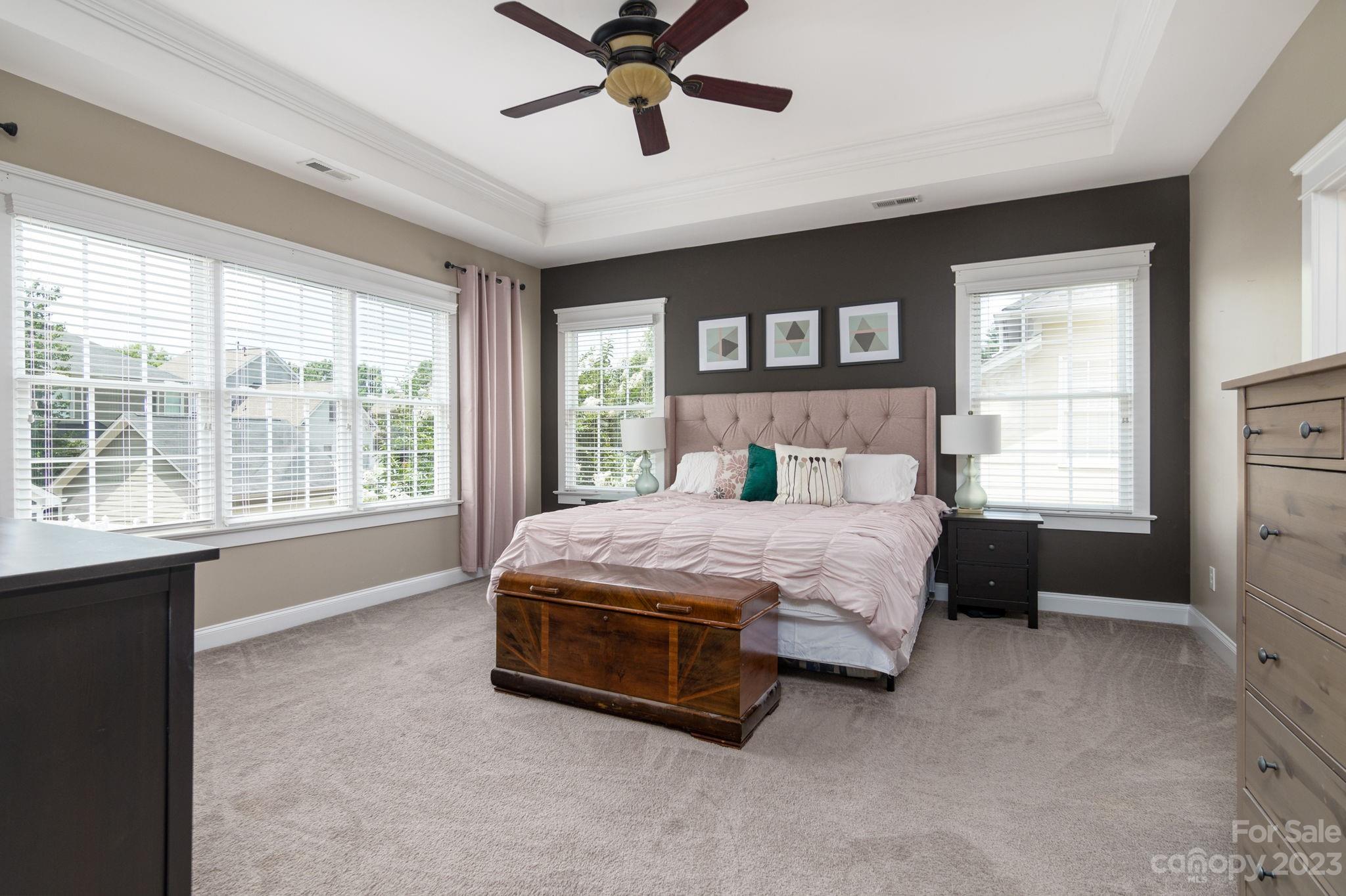 882 Promenade Walk Fort Mill, SC 29708 - Photo 14 of 48 a bedroom with a bed and a window