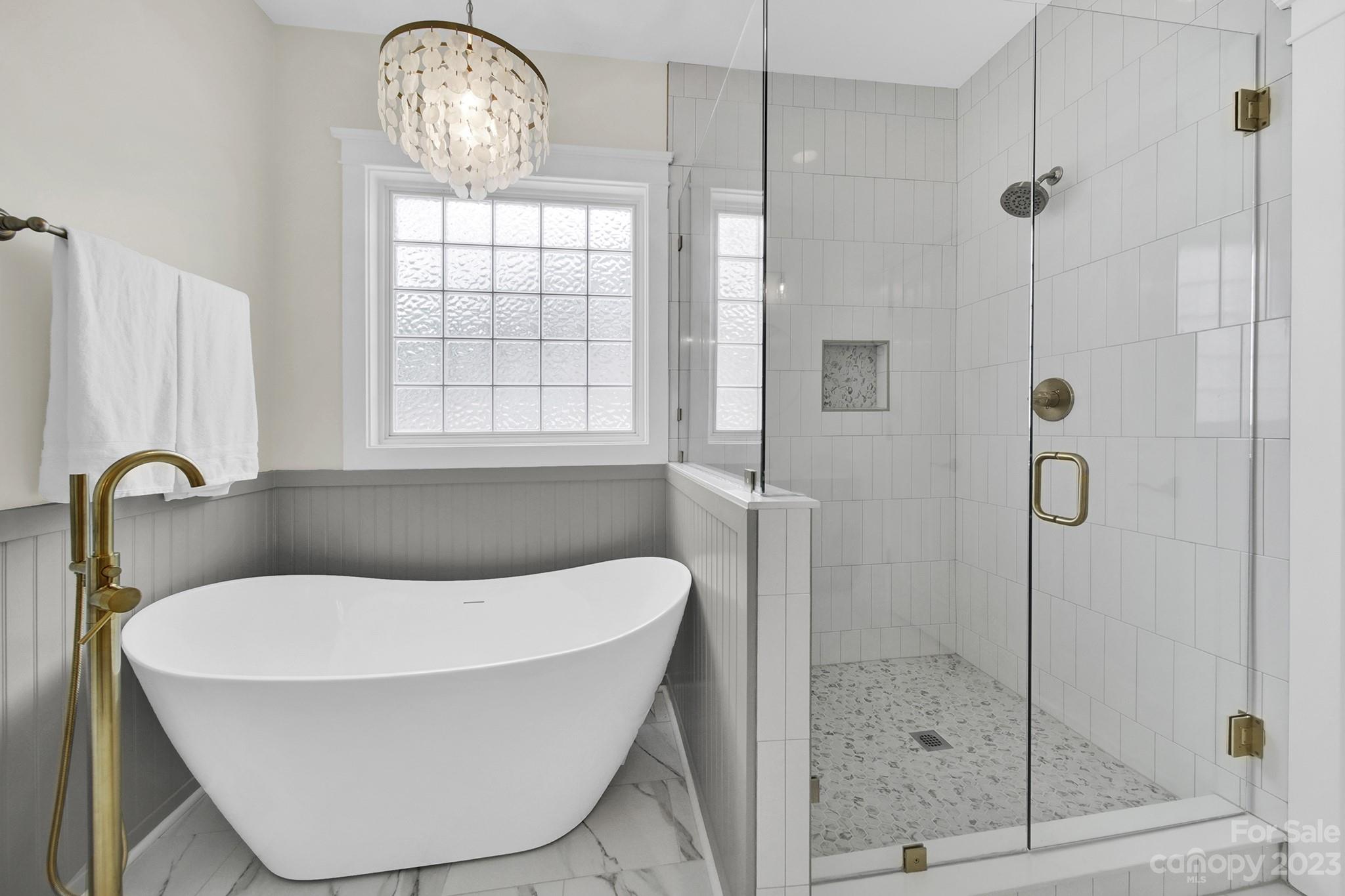 882 Promenade Walk Fort Mill, SC 29708 - Photo 17 of 48 a bathroom with a sink and a mirror