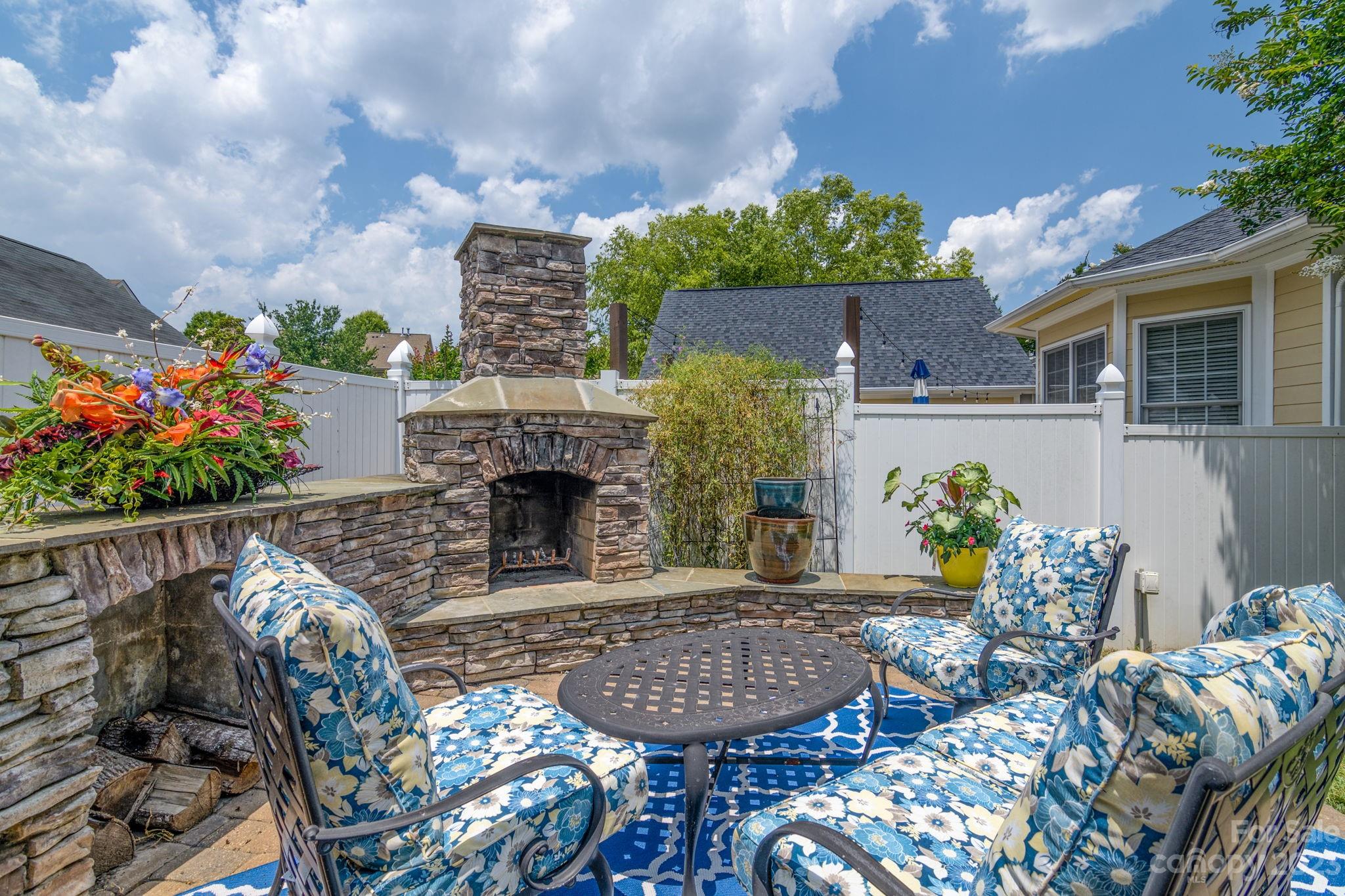 882 Promenade Walk Fort Mill, SC 29708 - Photo 31 of 48 a view of a chairs and table in a patio