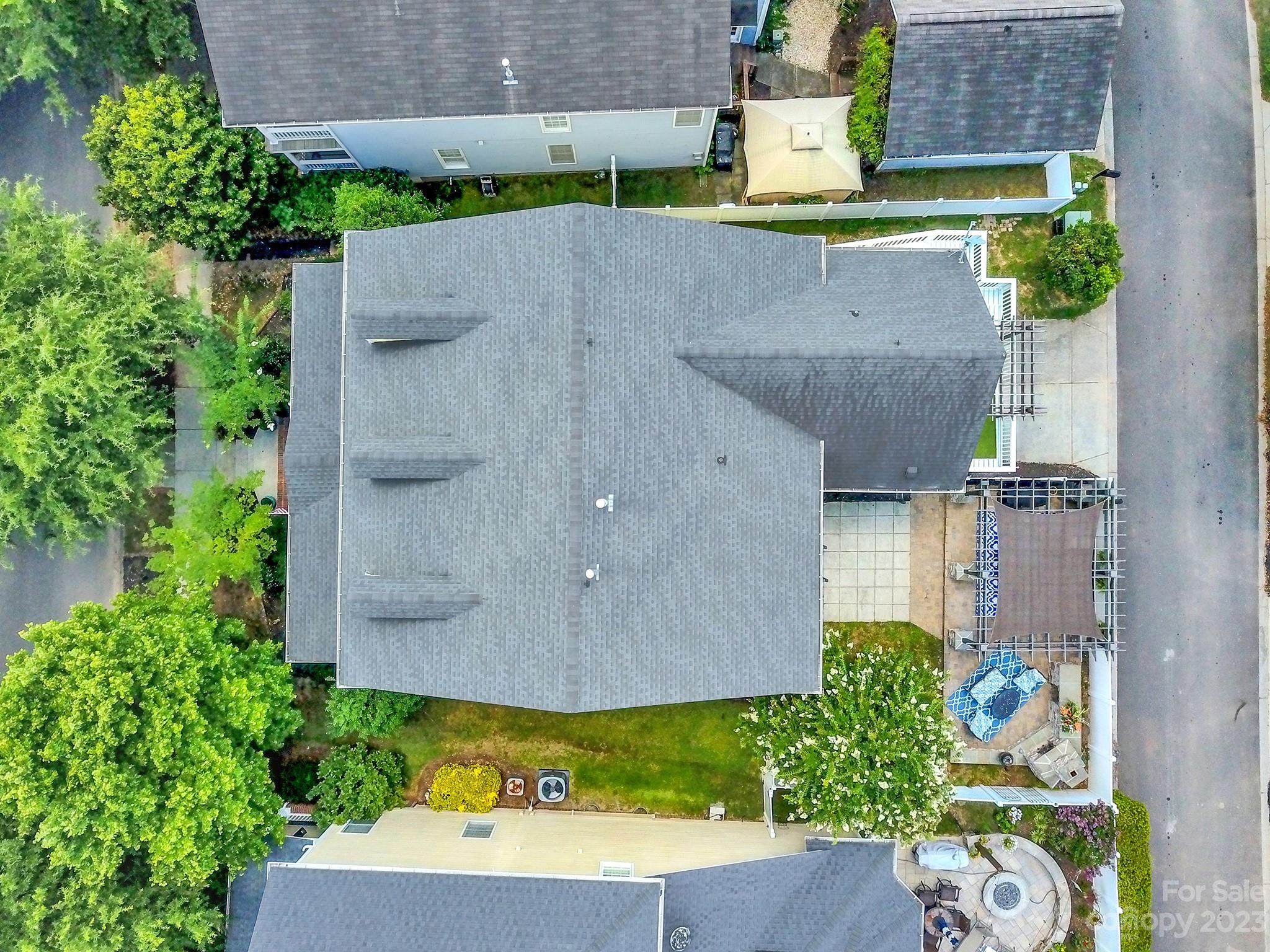 882 Promenade Walk Fort Mill, SC 29708 - Photo 37 of 48 an aerial view of a house with a garden and mountain view