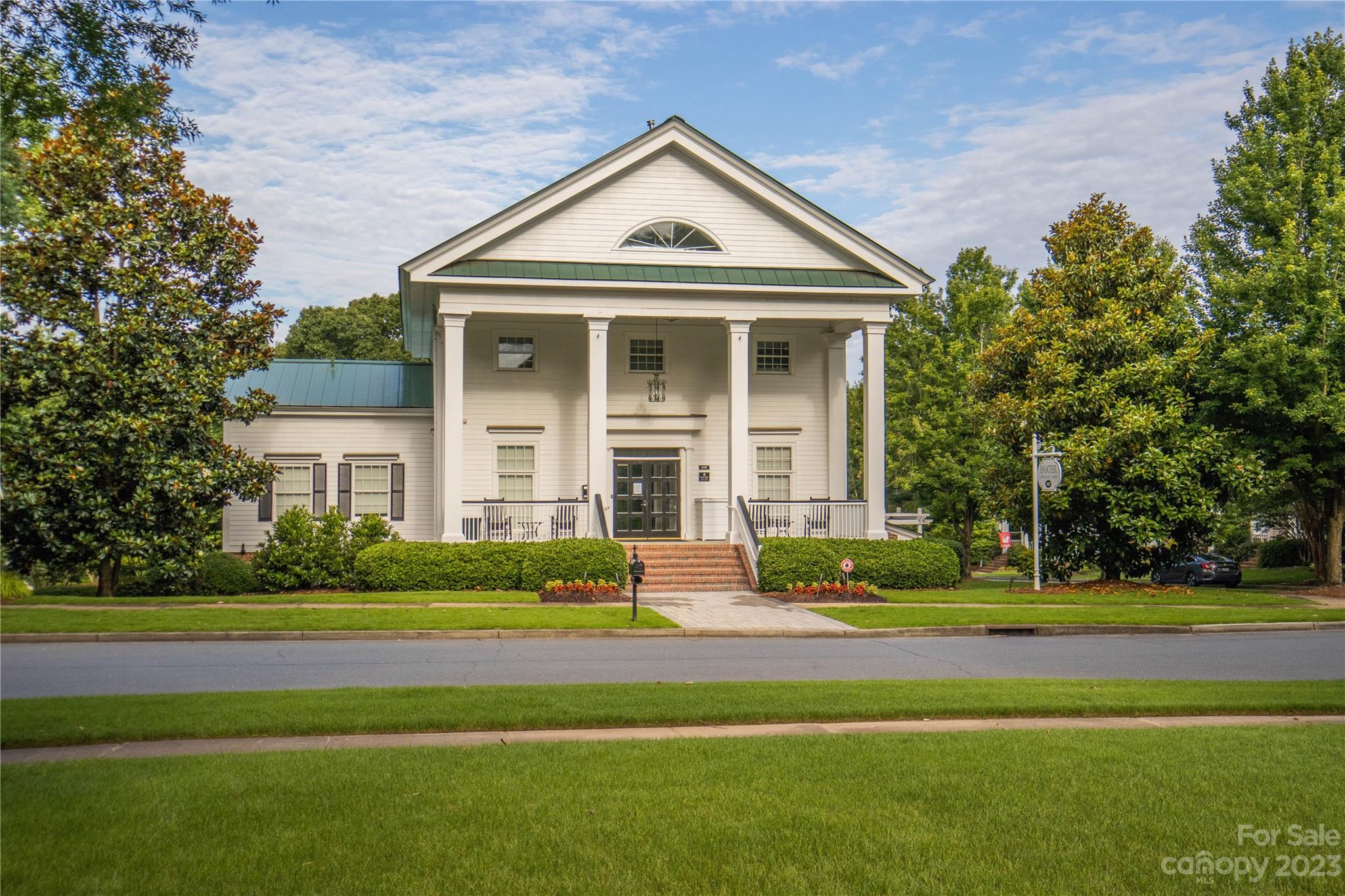 882 Promenade Walk Fort Mill, SC 29708 - Photo 41 of 48 a front view of a house with a yard