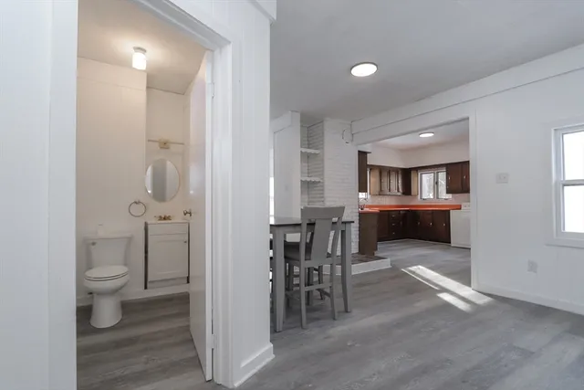 a view of a kitchen and dining room