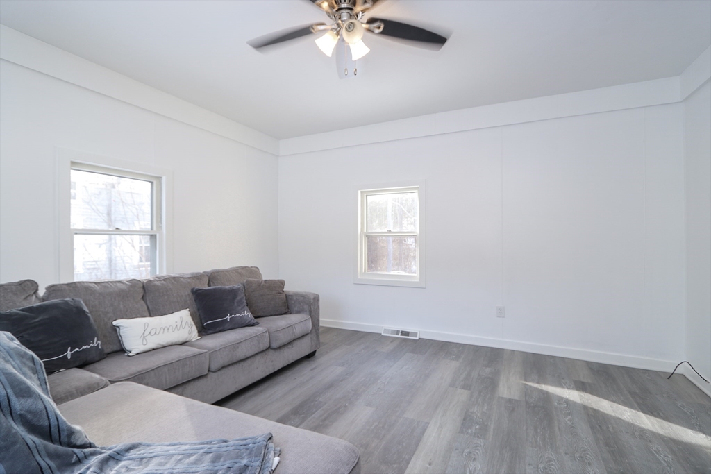 56 Middlefield Road Chester, MA 01011 - Photo 28 of 38 a living room with furniture and a window