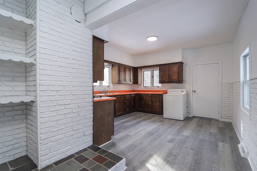 56 Middlefield Road Chester, MA 01011 - Photo 30 of 38 a kitchen with a sink and cabinets