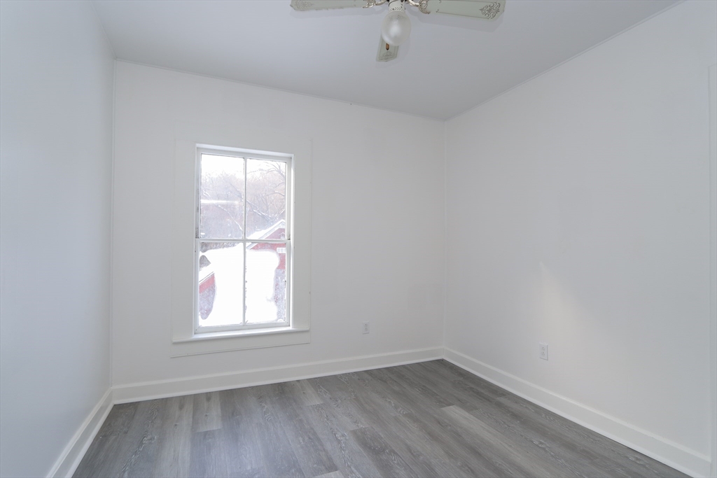 56 Middlefield Road Chester, MA 01011 - Photo 35 of 38 an empty room with a window
