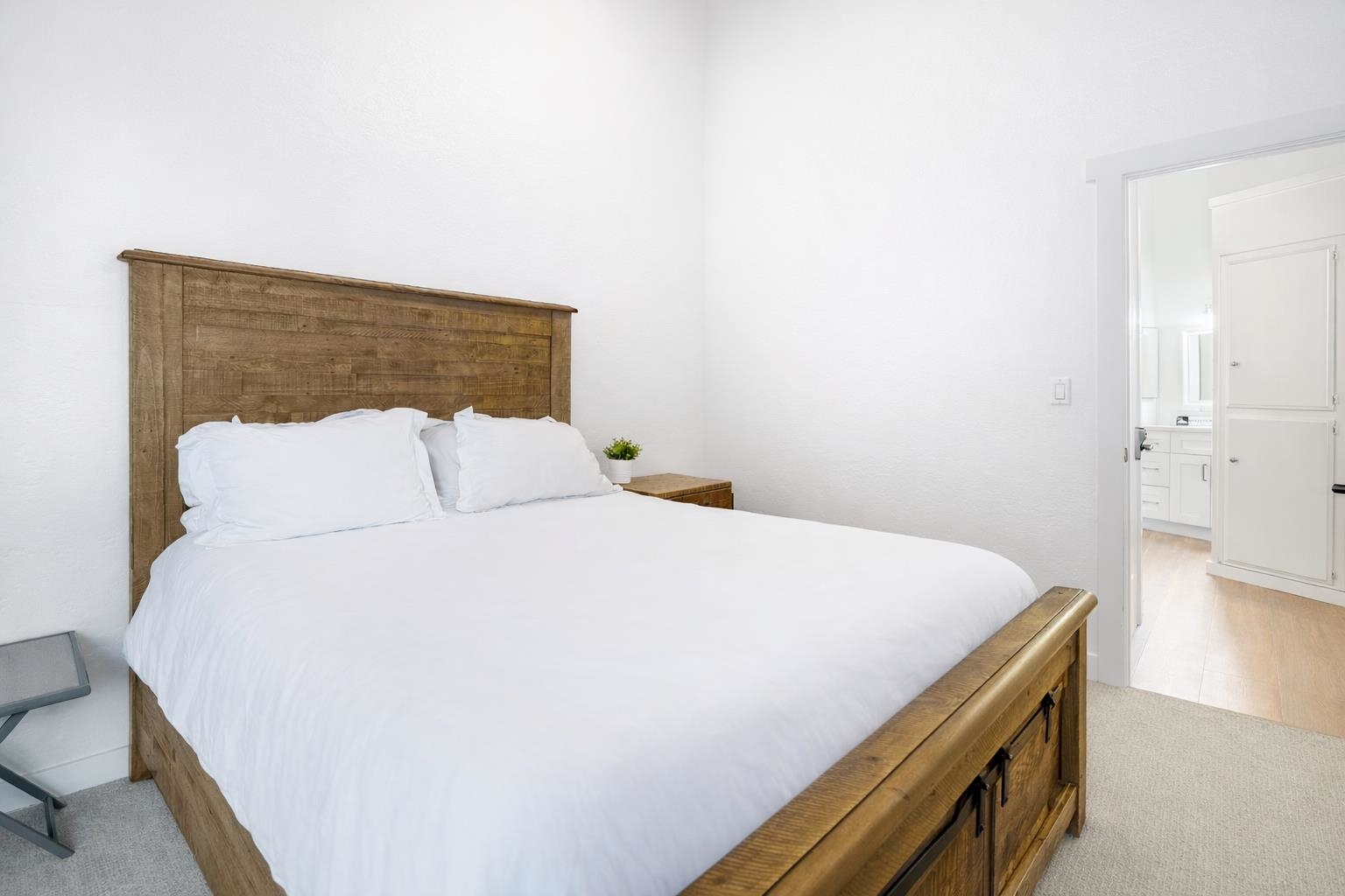 286 Old Mammoth Road, Unit 19 Mammoth Lakes, CA 93546 - Photo 14 of 19 a bedroom with a bed and a table
