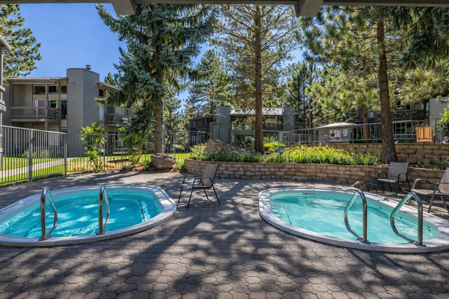 286 Old Mammoth Road, Unit 19 Mammoth Lakes, CA 93546 - Photo 17 of 19 a view of a swimming pool with a patio