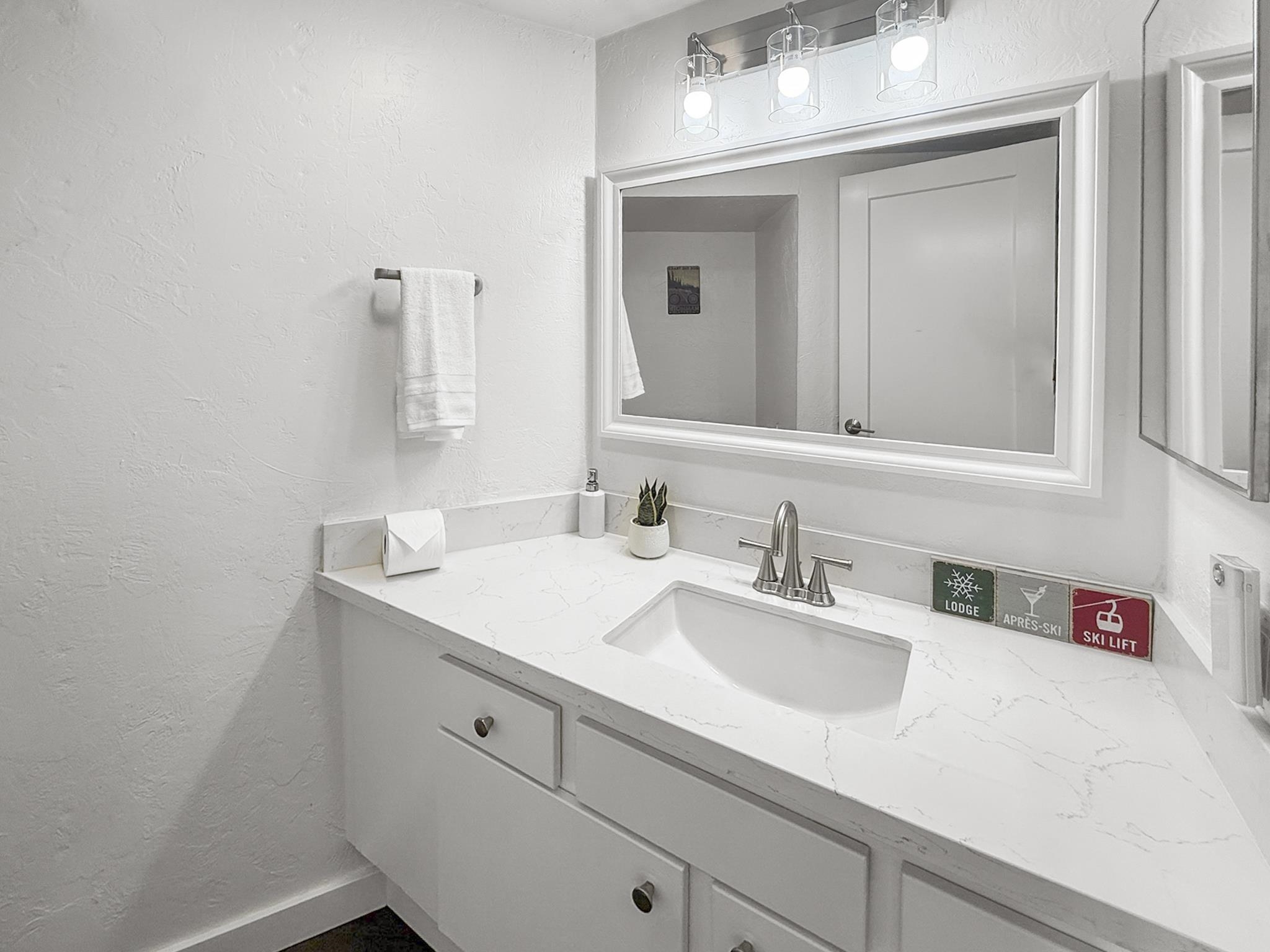 286 Old Mammoth Road, Unit 19 Mammoth Lakes, CA 93546 - Photo 7 of 19 a bathroom with a sink and a mirror