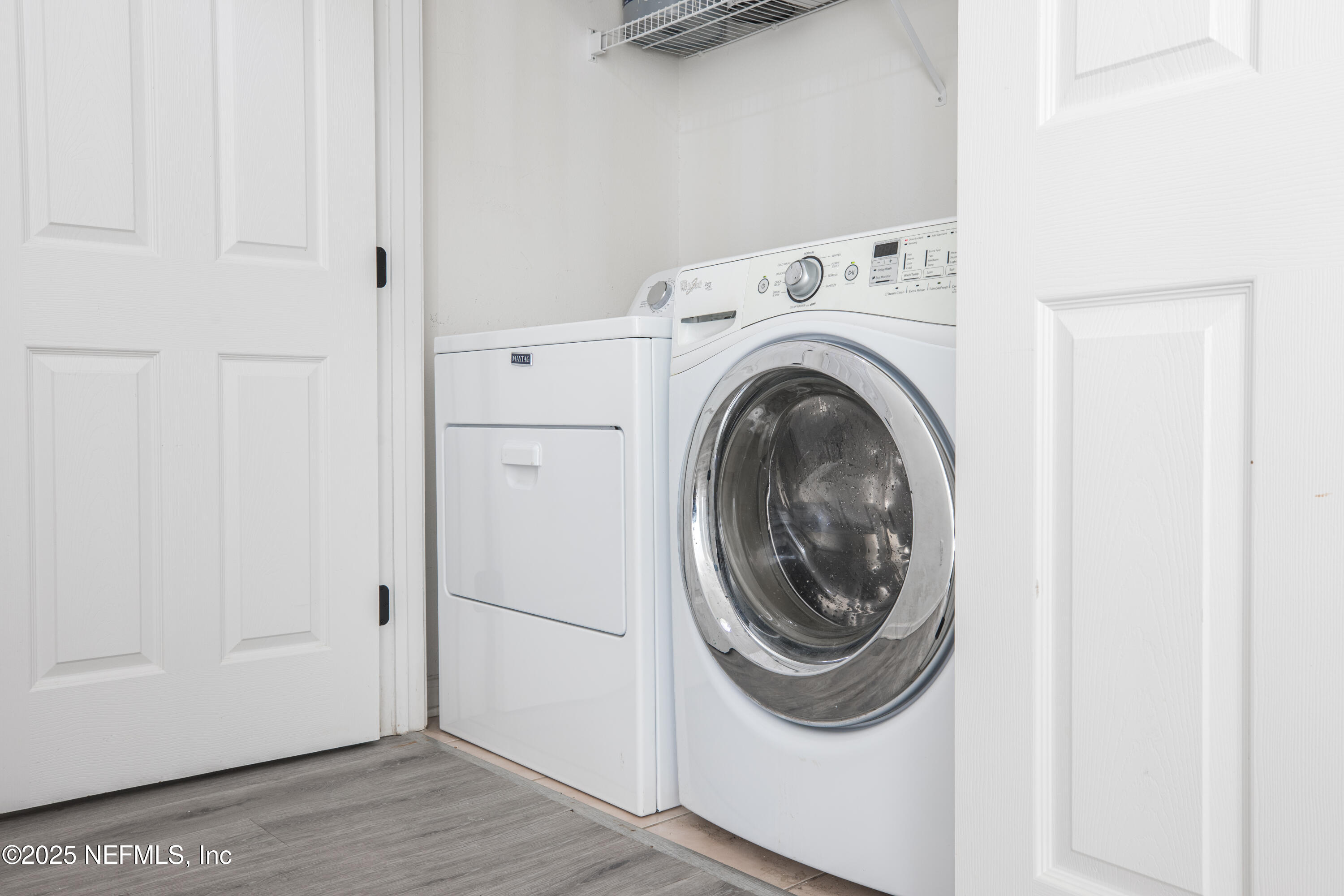 7990 Baymeadows Road, Unit 625 Jacksonville, FL 32256 - Photo 11 of 25 a utility room with dryer and washer